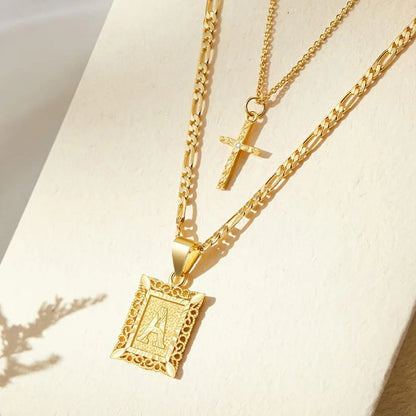 Set de 2 Collares de Inicial y Cruz en Oro de 14k